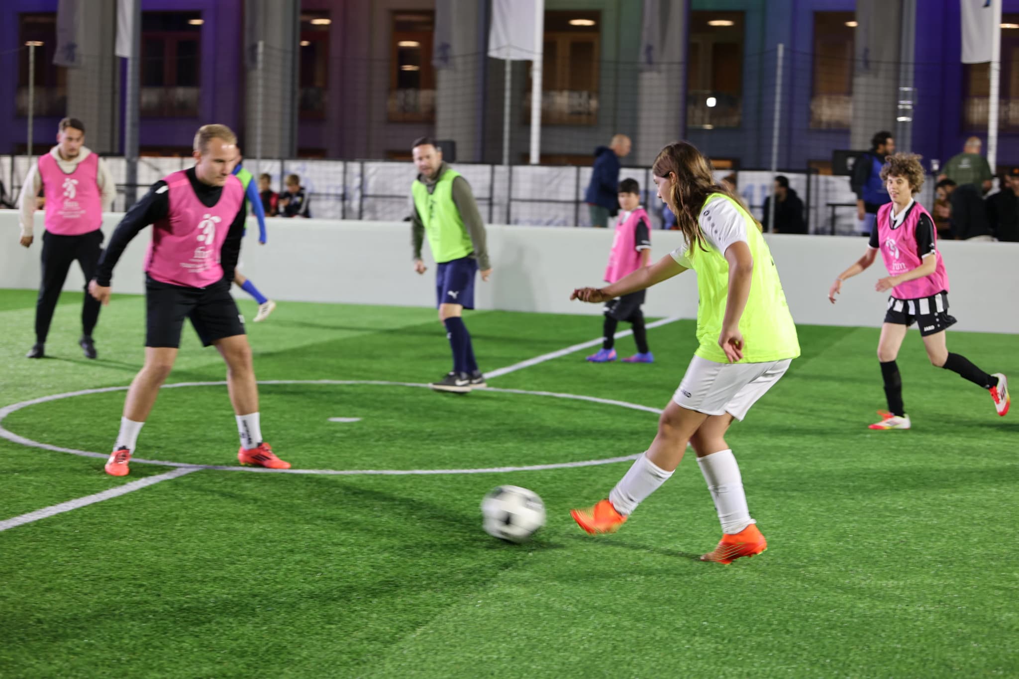 FOOTBALL IS MORE team collaborating with community partners