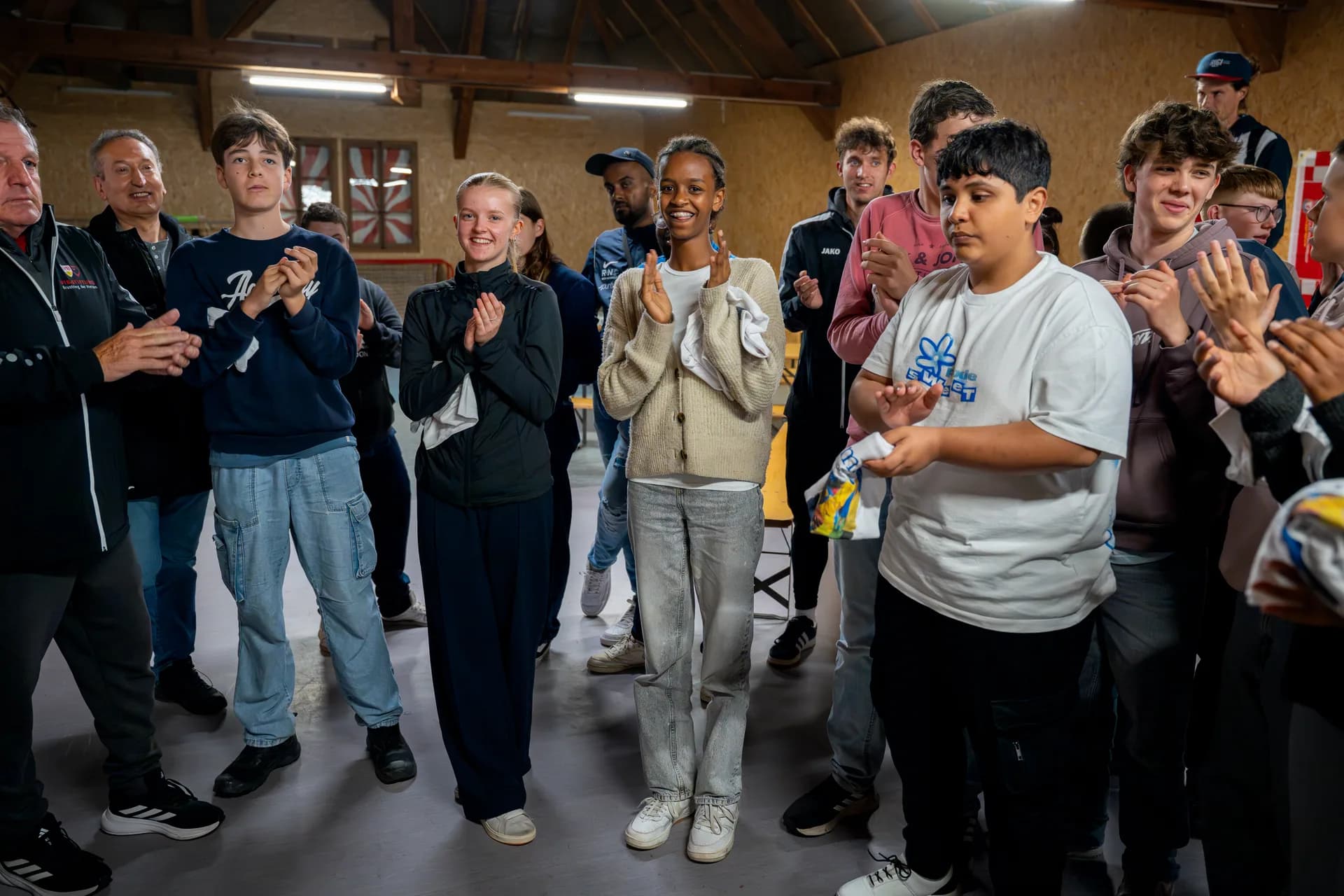 Members of the FIM–Family collaborating on the pitch